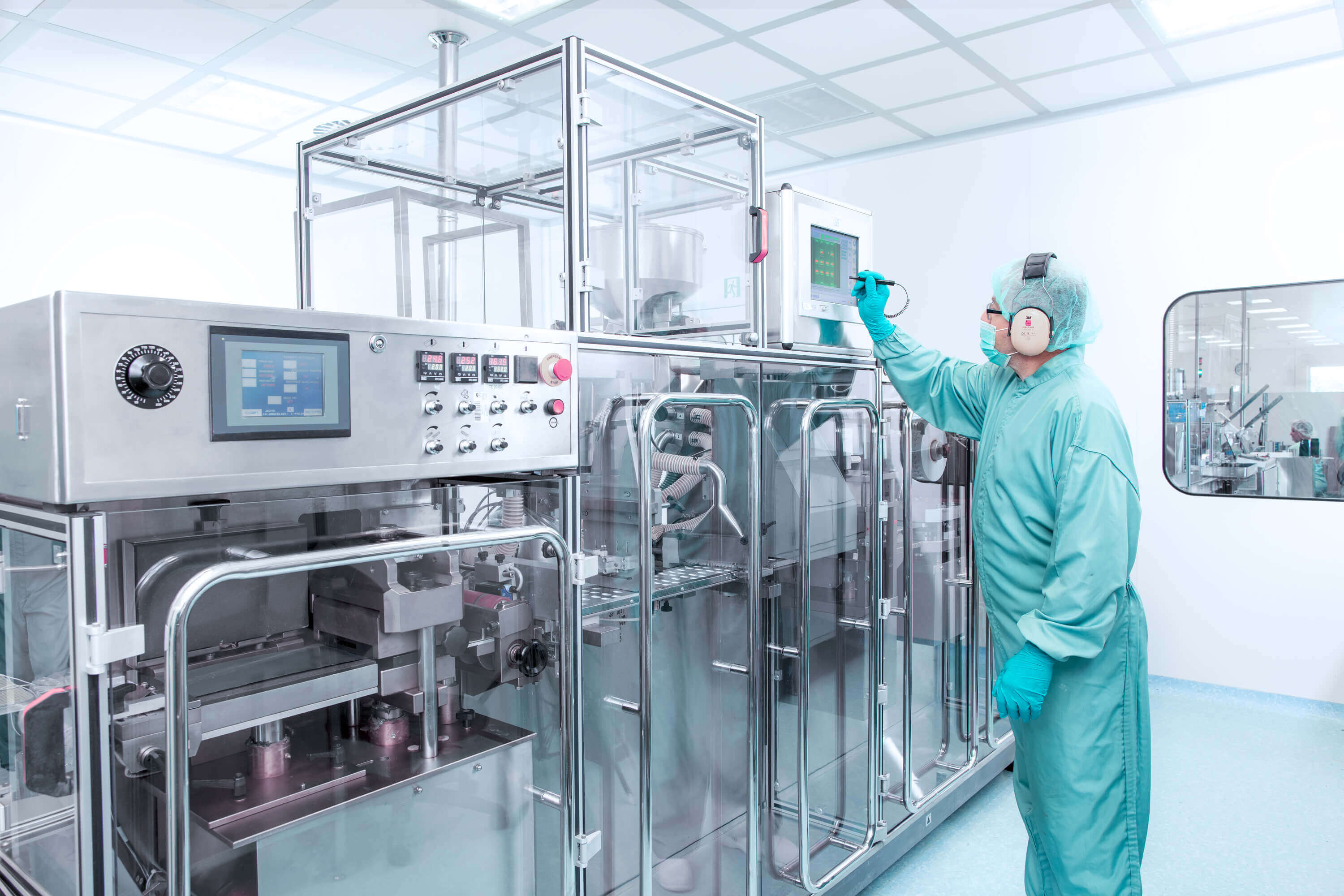 Worker at the machine