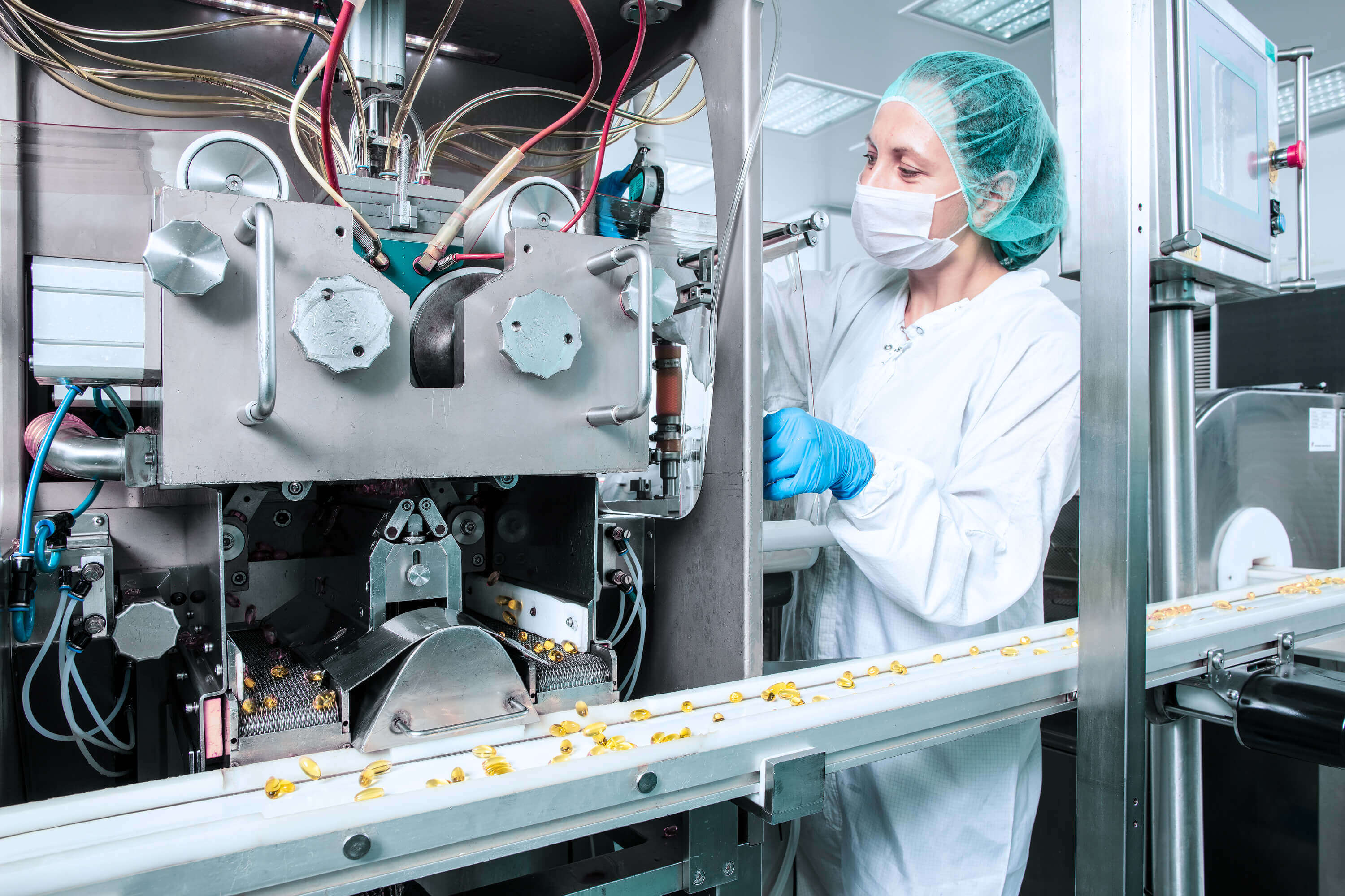 Woman in a protective mask at the machine